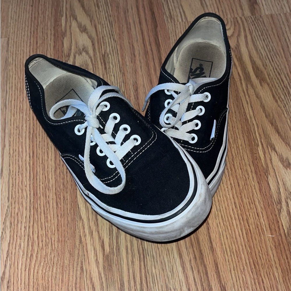 Used low top vans. Black. Size 5.5 men’s, 7.0 women’s